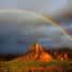 Weekend getaways in Sedona start at the Sedona Cathedral Hdeaway B & B and Sedona Vacation Rental - Stunning rainbow over red rocks!