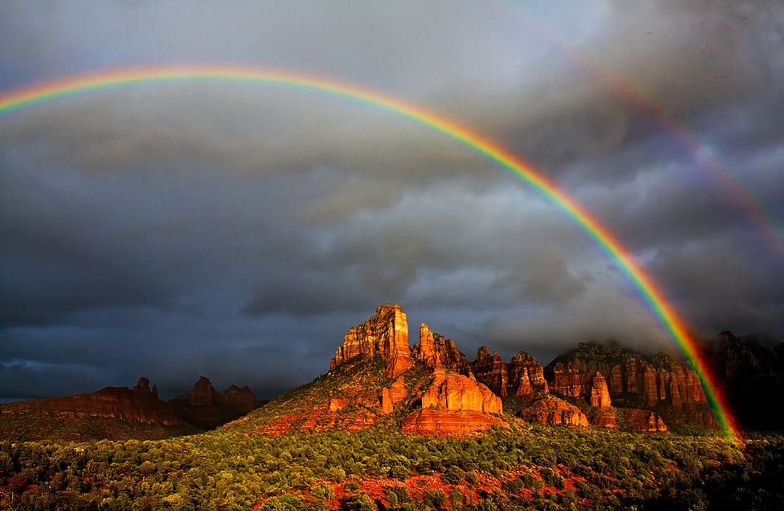 Weekend getaways in Sedona start at the Sedona Cathedral Hdeaway B & B and Sedona Vacation Rental - Stunning rainbow over red rocks!